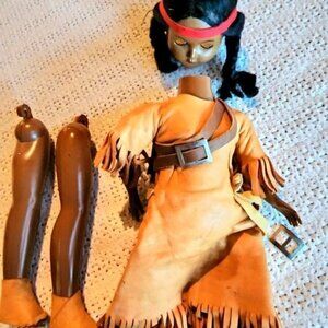 Vintage Indian Female Doll with Leather Outfit Carring Her Pappouse